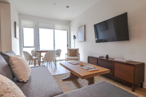 Trendy 2BR Steps to Promenade Beach & SM Pier!
